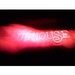 The Clubhouse Sign in the Rain