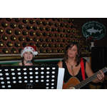 Jesse sings All I Want For Christmas is You. (Proud mom accompanies)