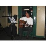 Rolland on Guitar and Vocals