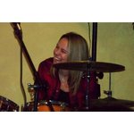 Kelly - not playing the drums