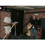 Mark accompanies Judi on the hammered dulcimer