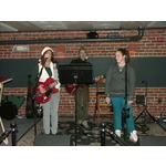 Katie sings backup for proud mama on Baby, Please Come Home.