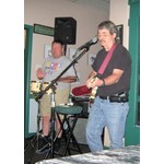 Howard Cunniffe on Guitar and Tom Kemme on Bongos